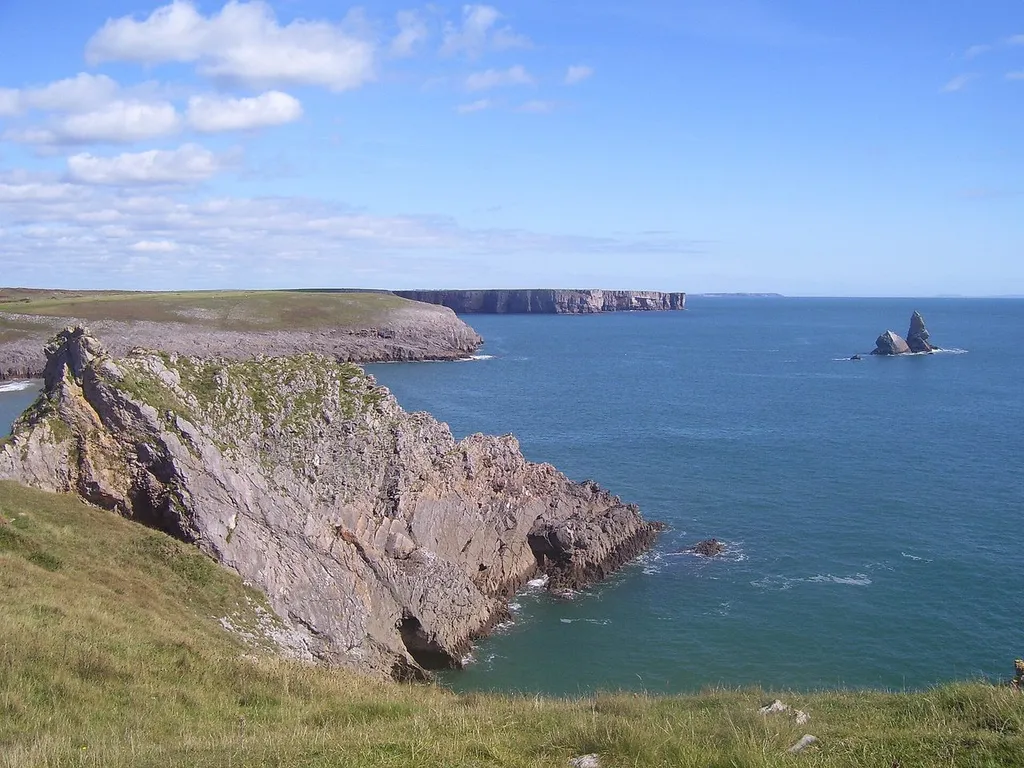 Church Rock sea stack off the white sand of Broad Haven South beach