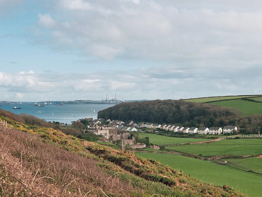Sailing boats moored off the waterfront at Dale on the Milford Haven waterway